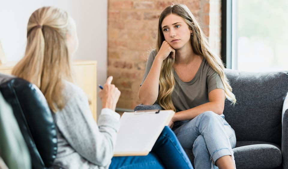 young-girl-listens-to-women-pregancy-crisis-centre