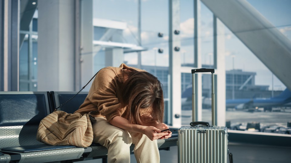 woman-upset-airport-yvr