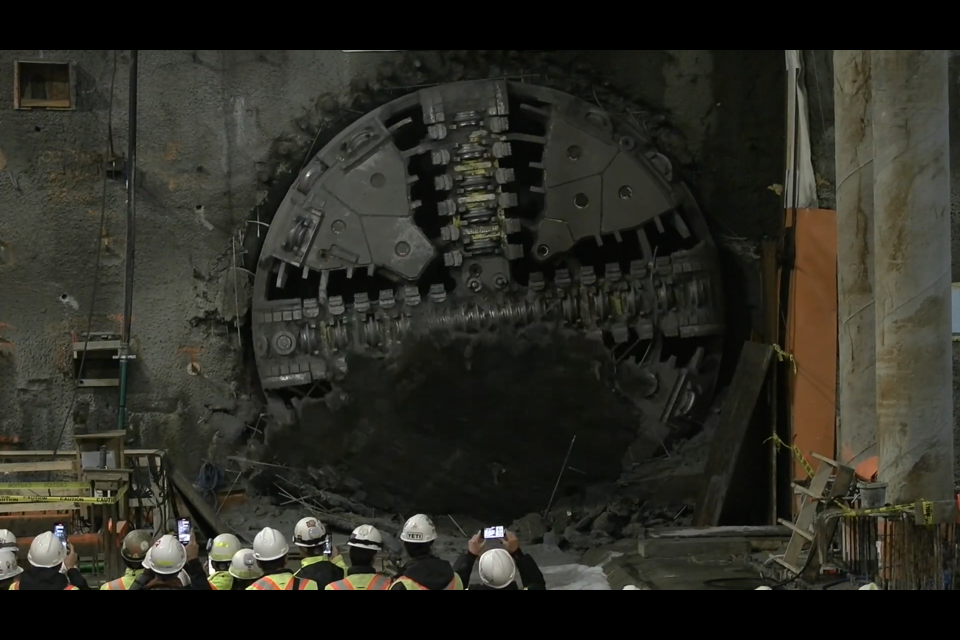 The boring machine knocks down a wall at the future site of the Mount Pleasant station on the Broadway subway line in Vancouver.