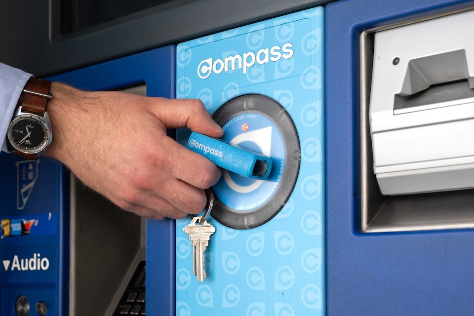 It is a miniature model SkyTrain that can attach to a keyring, and works like the Compass Card and Compass Wristband, allowing customers to tap in and out on transit.