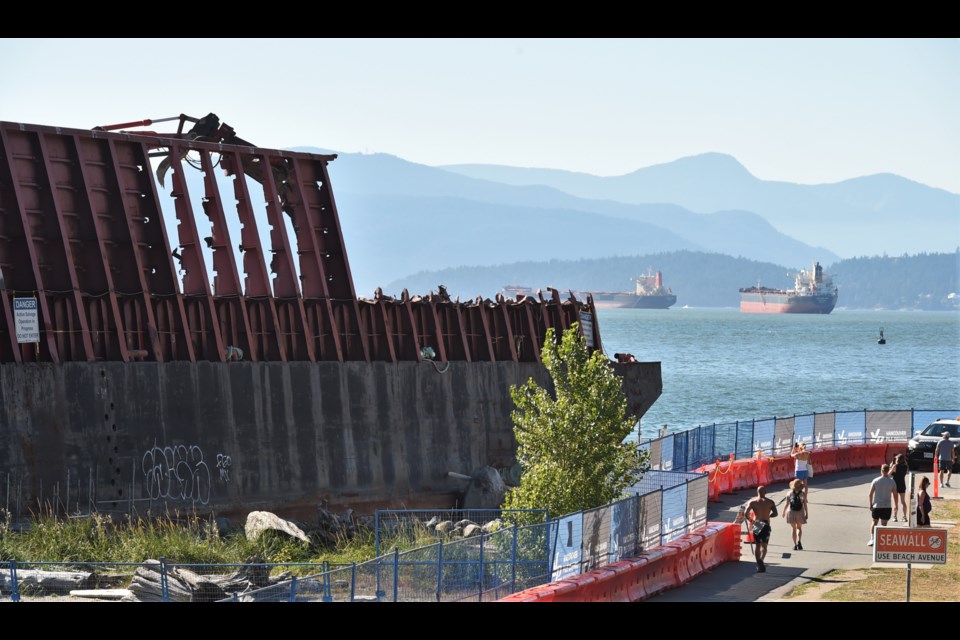 Some seawall walkers stopped to take pictures, while joggers generally didn't.