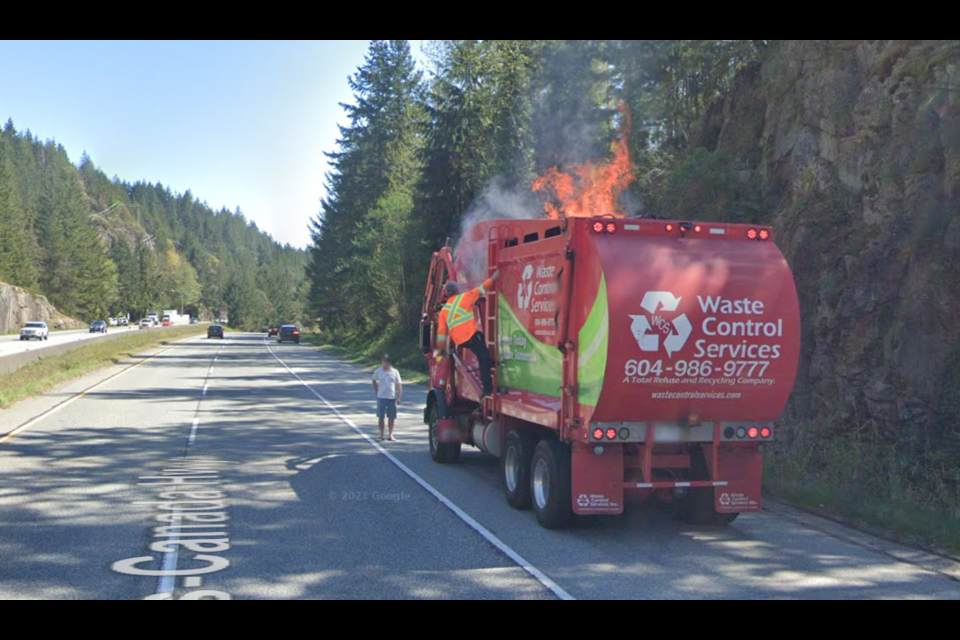 The fire in the back of the truck had flames pouring out the top.