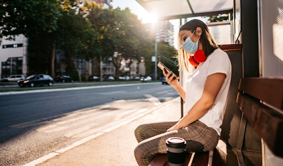 woman-waiting-bus-sun