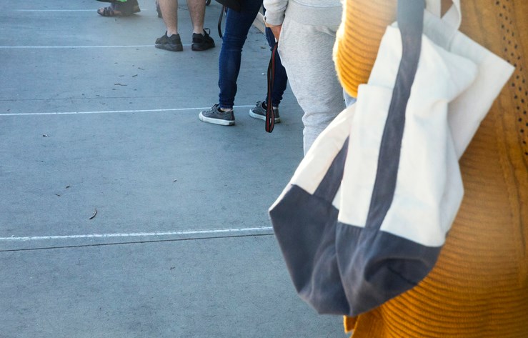 Waiting in line and practicing social distancing. Photo: stellalevi/iStock