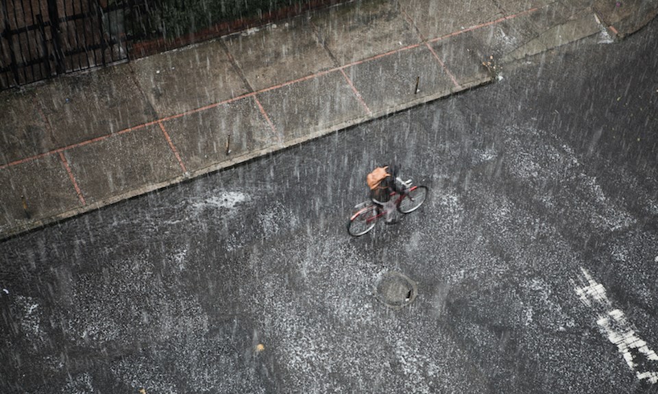 heavy-rain-falling-on-cyclist