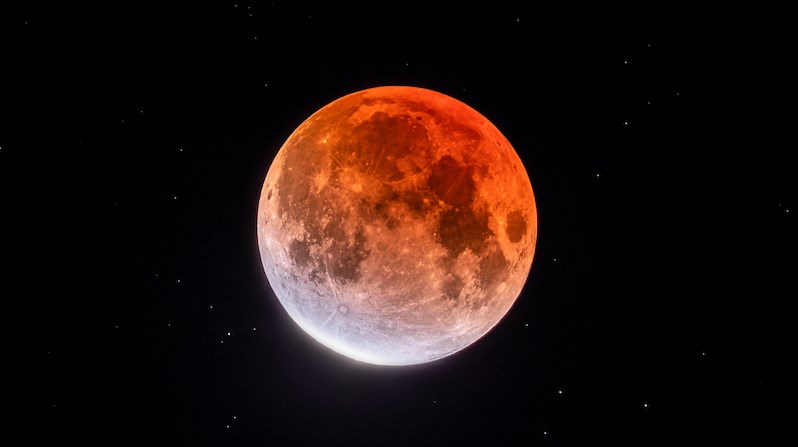 A local photographer is sharing spellbinding images he captured of the longest partial lunar eclipse in Vancouver skies on November 19, 2021. 