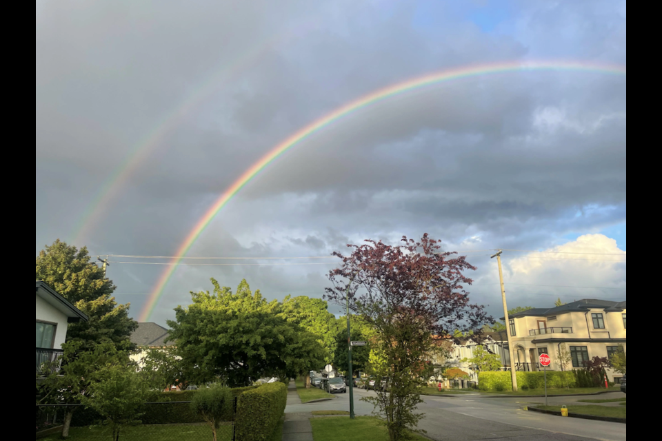 Locals shared photos of a double rainbow on Tuesday, May 20, 2025. The Metro Vancouver weather forecast includes more showers.