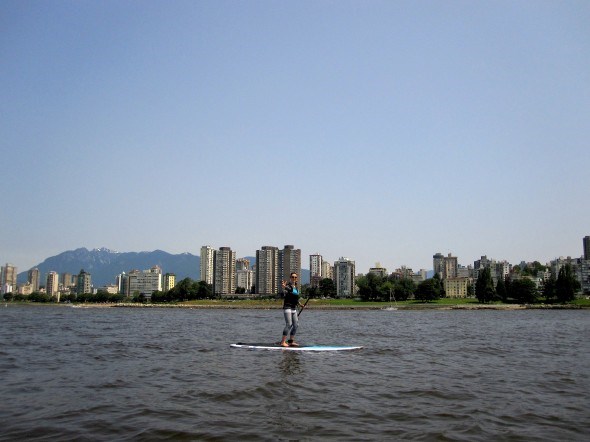 Yogi Elle Basten on a stand up paddle board in Vancouver