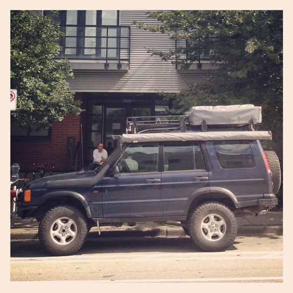 Lifted Land Rover Discovery with Rooftop Tent