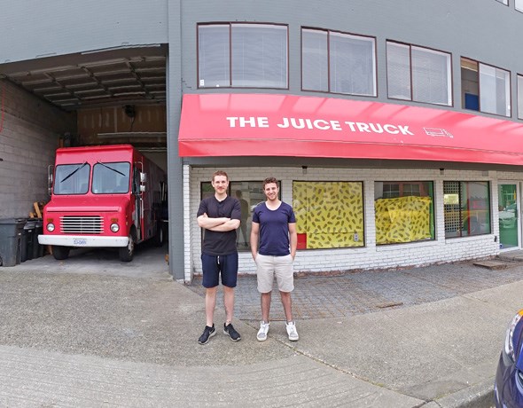 The Juice Truck founders Zach Berman and Ryan Slater in front of their soon-to-be-opened new operation