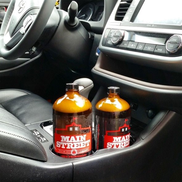  Their sessional IPA and pilsner in mini-growlers, on their way home to the fridge!