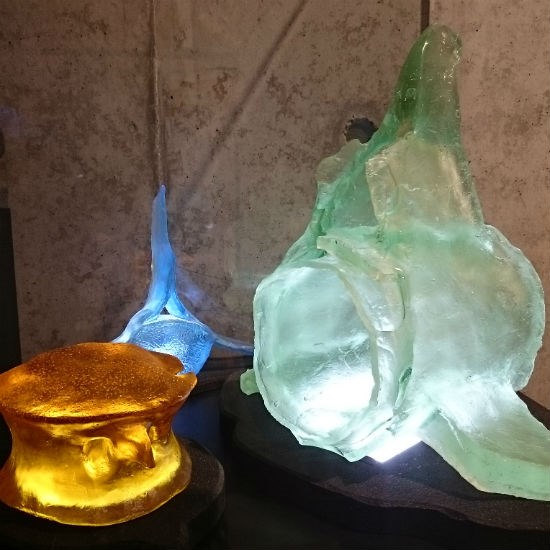  Glowing jewel-like cast lead crystal glass whale bones. Art by Colleen McLaughlin Barlow.