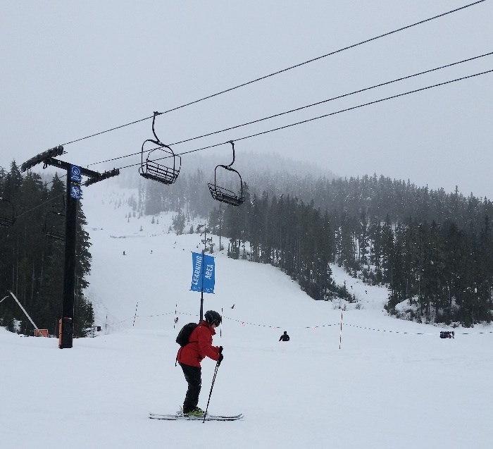  Karine skiing.