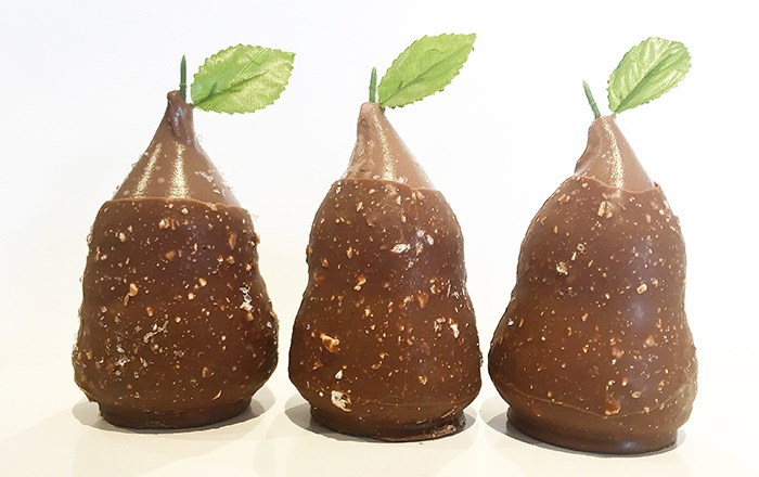  Hazelnut gelato shaped like a pear and dipped in a specially created chocolate with torrone pieces.