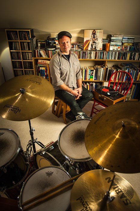  Geoff Hicks spinning some vinyl at home.