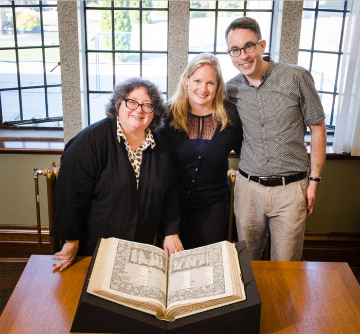  Standing behind this $202,000 book are Melody Burton, Head Librarian, Katherine Kalsbeek Head of Rare Books and Special Collections and Dr. Gregory Mackie, assistant professor in UBC’s department of English. Photo: UBC Library