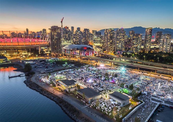  The DEBVAN 2016 event hosted more than 6,000 invited guests in an asphalt parking lot overlooking False Creek. Photo: Heliwood Media