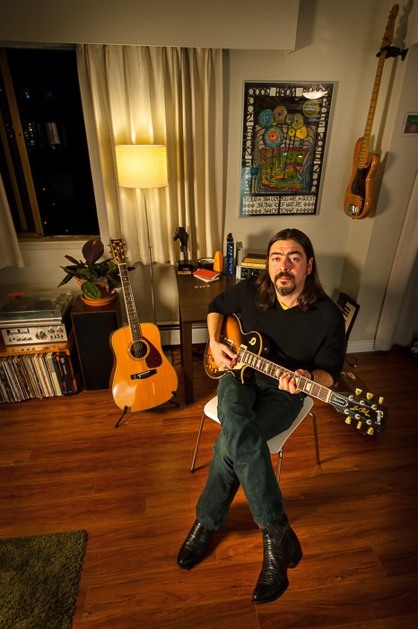  Leo relaxing in his West End apartment.