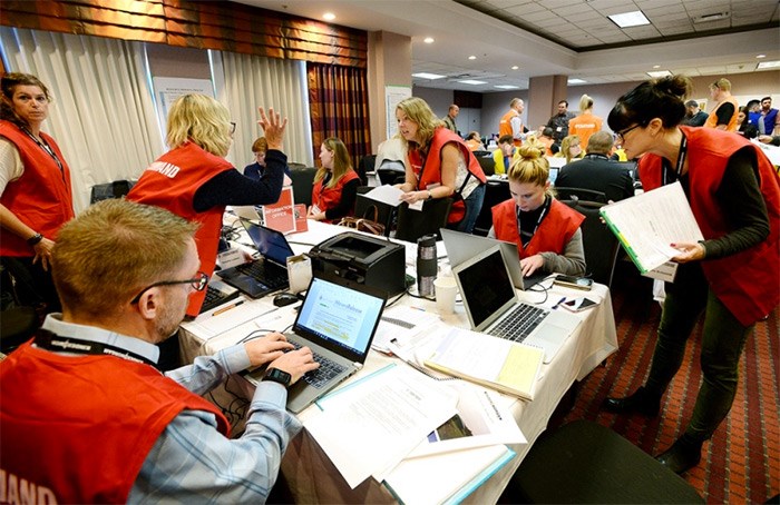  Ali Hounsell (centre), spokesperson for the Trans Mountain expansion project, leads the information office team at the incident command post in Coquitlam. The post was set up as part of a full-scale emergency response exercise at Kinder Morgan's Burnaby Terminal.   Photograph By Jennifer Gauthier