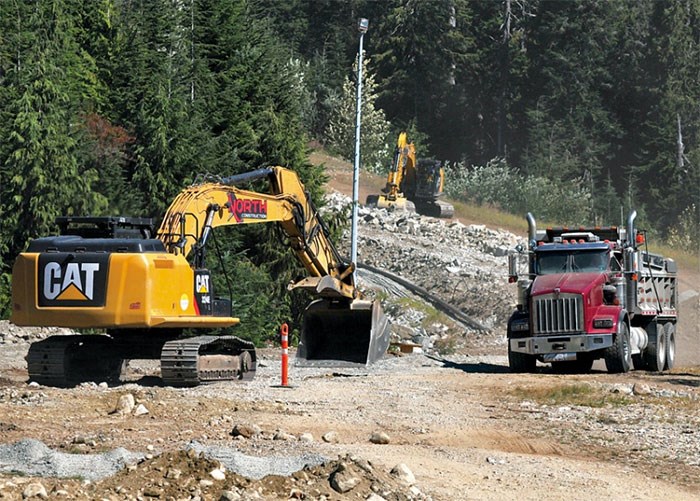  Work is underway on a $1.2 million snowmaking expansion at Cypress Mountain that includes the installation of five snow guns along Collins ski run to the top of the Lions Express chairlift, to be completed in time for this winter season. photo Paul McGrath, North Shore News