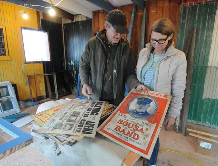  At Maplewood Farm, artists Jeremy and Sus Borsos are currently restoring a relic from the Dollarton squatter era. The couple discovered event posters from the 1920s when they reached the Blue Cabin’s subfloor. photo Mike Wakefield, North Shore News