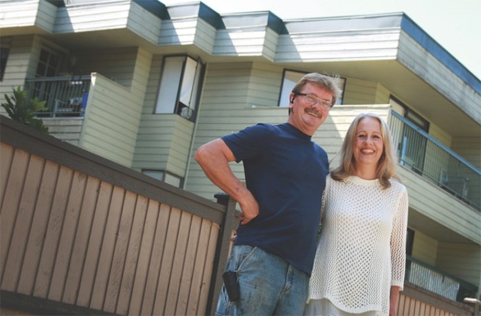  Christine Raverty and husband Steve Handy were part of a successful bid to block the sale of their Vancouver condo building. Photograph By ROB KRUYT