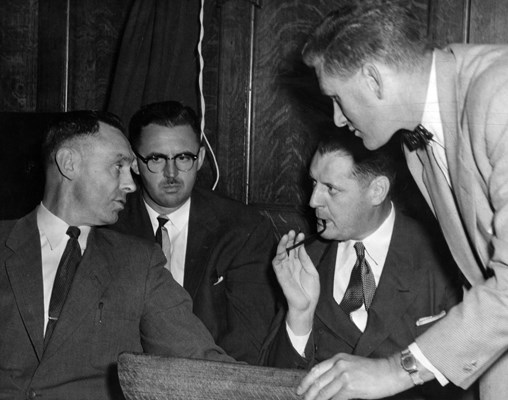  Left to right: CIB Superintendent Jack Harlon, Records Superintendent John Fisk, Chief Walter Mulligan, and Constable Stan Leacock. Photo: Vancouver Sun.