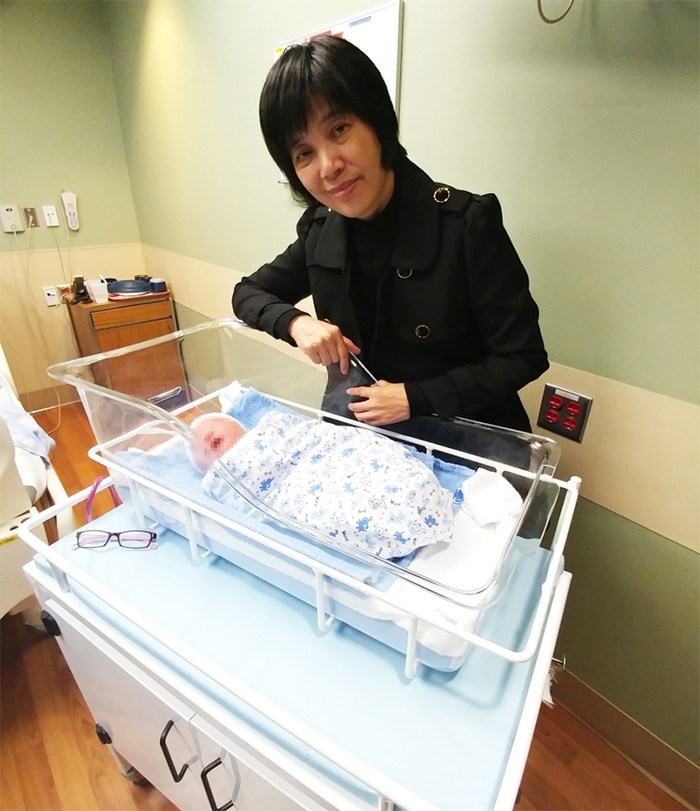 Xi An, above, at Richmond Hospital, began a maternity business that helps connect local moms to various services, but over the past few years, non-residents have become her client base.