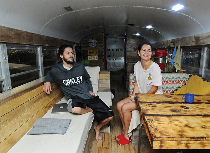  Quebec natives Laurence Ricard-Lacombe and Yanael Prat-Samuel spent $8,000 converting a school bus into a home. - photo Cindy Goodman, North Shore News