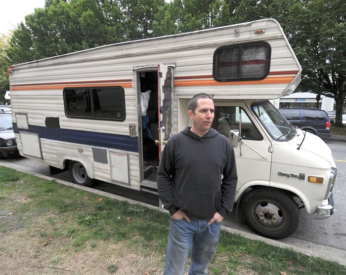  William Price wasn’t a fan of apartment life, so now he lives in an RV on the street just down the block from his workplace. He says he has no interest in moving. - photo Mike Wakefield, North Shore News