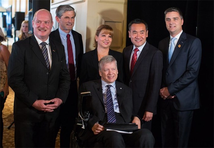  B.C. Liberal leadership candidates Mike de Jong, from left to right, Andrew Wilkinson, Dianne Watts, Sam Sullivan, Michael Lee and Todd Stone pose for a photograph before taking the stage for the first leadership debate in Surrey, B.C., on Sunday October 15, 2017. THE CANADIAN PRESS/Darryl Dyck
