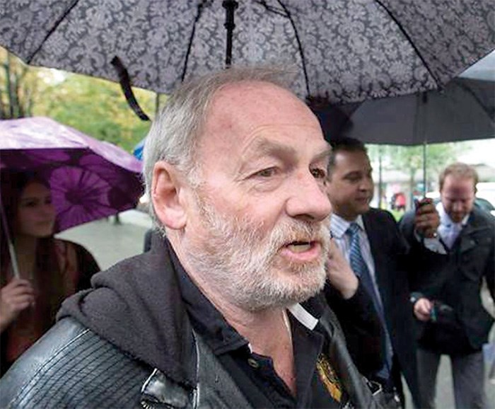 Five women have launched a civil lawsuit against Ivan Henry, claiming he sexually assaulted them in the 1980s. Ivan Henry is seen here outside court. photo courtesy Global TV