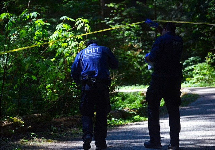  Homicide investigators search for evidence at Burnaby's Central Park in July after the death of a 13-year-old girl.