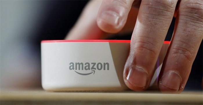  An Amazon Echo Dot is displayed during a program announcing several new Amazon products by the company, Wednesday, Sept. 27, 2017 in Seattle. It's like a technology-themed reality TV dating show. Suitor Amazon is on the hunt for a North American city to house what it calls HQ2: a second headquarters. THE CANADIAN PRESS/Elaine Thompson