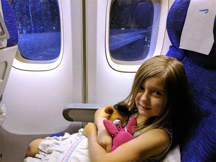  Seven-year-old Molly Reid is seen on a British Airways flight on October 10, 2017 in this handout photo. Heather Szilagyi was on a British Airways flight with her seven-year-old daughter and fiancee Eric Neilson on Oct. 10 when she said they noticed what appeared to be bedbugs crawling out of the seat in front of them. She said the flight attendants couldn't move them because there were no other available seats on the plane. After landing, Szilagyi discovered they were covered in bites. THE CANADIAN PRESS/HO, Heather Szilagyi 