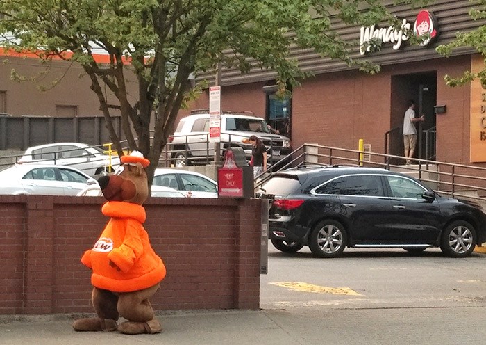  The A&W mascot seen outside Wendy's on Cambie Street in Vancouver, August 2017. Photo Bob Kronbauer