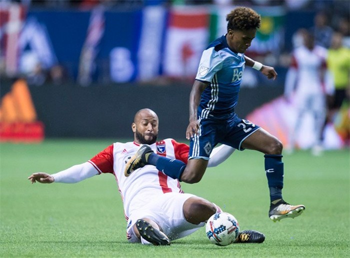  Vancouver Whitecaps' Yordy Reyna, right, leaps over San Jose Earthquakes' Victor Bernardez as he slides to take the ball away during the second half of an MLS soccer game in Vancouver, B.C., on Sunday October 15, 2017. The Whitecaps like to talk about making history. They have a chance to finally do it on the big stage Wednesday night. THE CANADIAN PRESS/Darryl Dyck