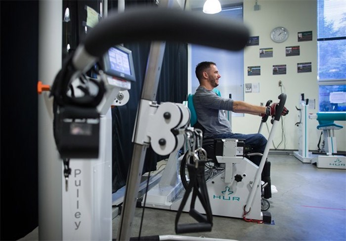  Brad Skeats, who has a spinal cord injury, works out at the Physical Activity Research Centre at the International Collaboration on Repair Discoveries, in Vancouver, B.C., on Wednesday October 25, 2017. People with spinal cord injuries now have a set of exercise guidelines for maintaining heart health to match those offered to the general population decades ago. THE CANADIAN PRESS/Darryl Dyck