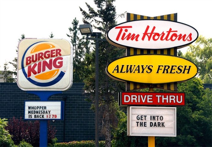  Restaurant Brands International Inc. says it earned US$91.4 million in its latest quarter as sales at its Burger King restaurants improved. THE CANADIAN PRESS/Sean Kilpatrick