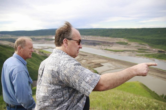  BC Green Leader Andrew Weaver (right) takes in a bird's eye view of Site C construction from a private landowner's viewpoint: 