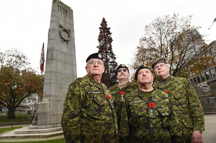  Vancouver's largest Remembrance Day ceremony takes place at the Victory Square cenotaph Nov. 11. Photo Dan Toulgoet