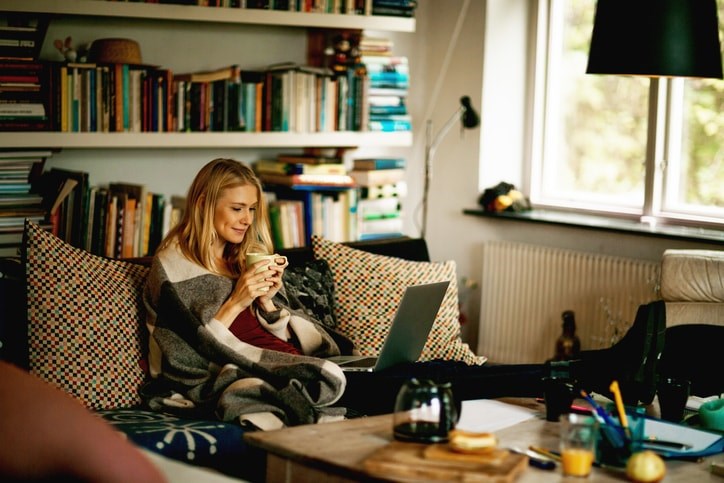  Relaxing on couch/iStock