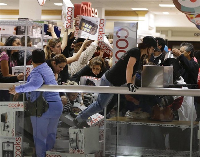  Shoppers rush to grab electric griddles and slow cookers on sale for $8 shortly after the doors opened at a J.C. Penney story in Las Vegas on November 23, 2012. Chaotic images of people clamouring to be the first through the doors to get their hands on hot deals have become synonymous with Black Friday in recent years. However, the one-day shopping frenzy at malls and stores following American Thanksgiving may be on the decline as some consumers and retailers start to shun the tradition by either opting out entirely or turning to internet shopping instead. THE CANADIAN PRESS/AP, Julie Jacobson