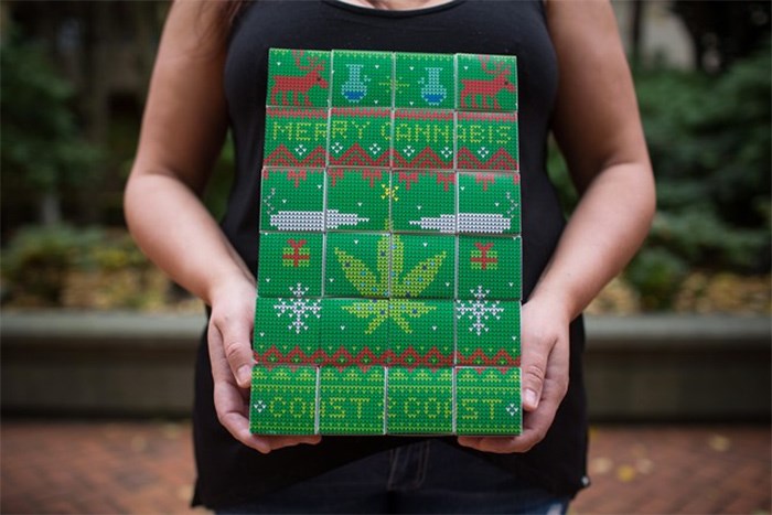  Lorilee Fedler, owner of Coast to Coast Medicinals, is pictured with her cannabis Christmas calendars in Vancouver, B.C., on Saturday November 25, 2017. A Vancouver cannabis company is scrambling to keep up with a flood of orders for marijuana-filled advent calendars, but the novel take on a popular Christmas tradition has some health experts ringing alarm bells. THE CANADIAN PRESS/Ben Nelms
