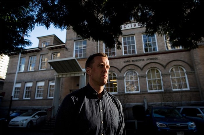  Teacher Brent Mansfield poses for a photograph outside Lord Roberts Elementary School in Vancouver, B.C., on Wednesday December 6, 2017. Teachers have their pick of jobs in British Columbia, but the head of their union warns that some students are going without their specially trained educators who are covering substitute positions that districts haven't been able to fill. THE CANADIAN PRESS/Darryl Dyck