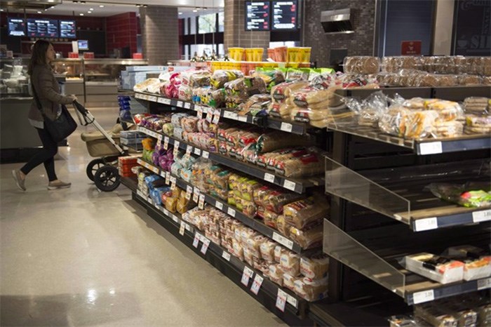  Various brands of bread sit on shelves in a grocery store in Toronto on Wednesday Nov. 1, 2017. THE CANADIAN PRESS/Doug Ives