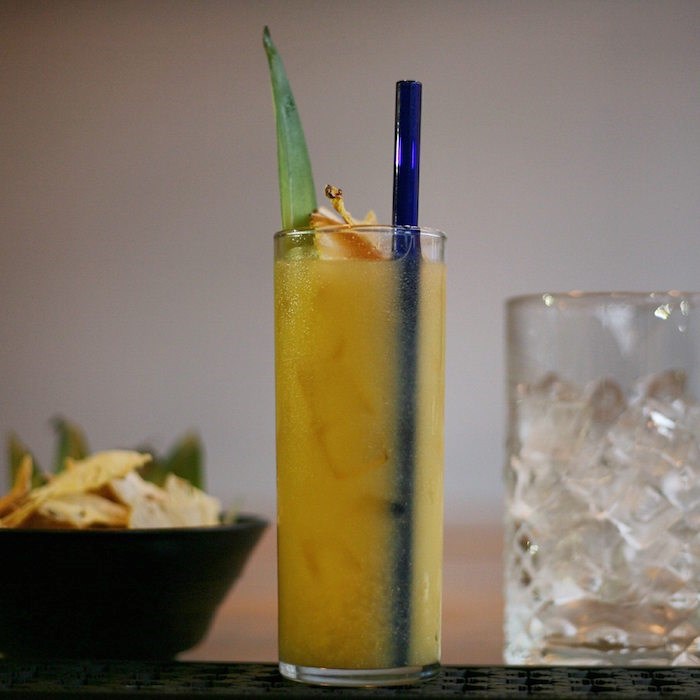  A cocktail from The Cascade Room served with a glass straw (