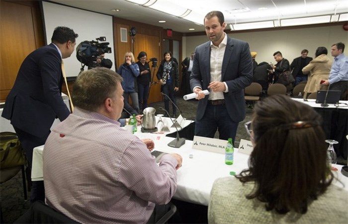  Michael van Hemmen of Uber Canada speaks members of the committee on ride-sharing following his presentation in downtown Vancouver, Monday, Jan. 8, 2018. THE CANADIAN PRESS/Jonathan Hayward