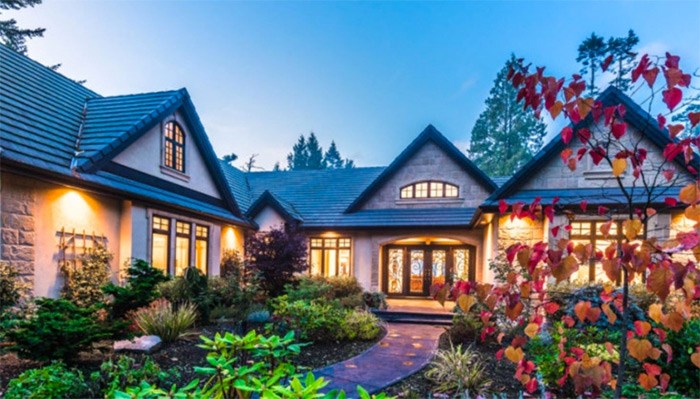  This gorgeous custom-built home in Qualicum Beach is listed on the Bitcoin Real Estate website