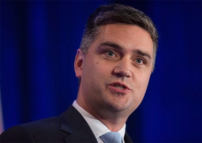  B.C. Liberal leadership candidate Todd Stone speaks during the first leadership debate in Surrey, B.C., on Sunday October 15, 2017. One of the contenders vying to lead British Columbia's Liberal party won't have the backing of 1,349 prospective members who were disqualified from voting because of incomplete applications. THE CANADIAN PRESS/Darryl Dyck